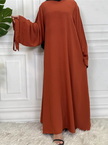 Blush Elegance Belted Maxi Dress